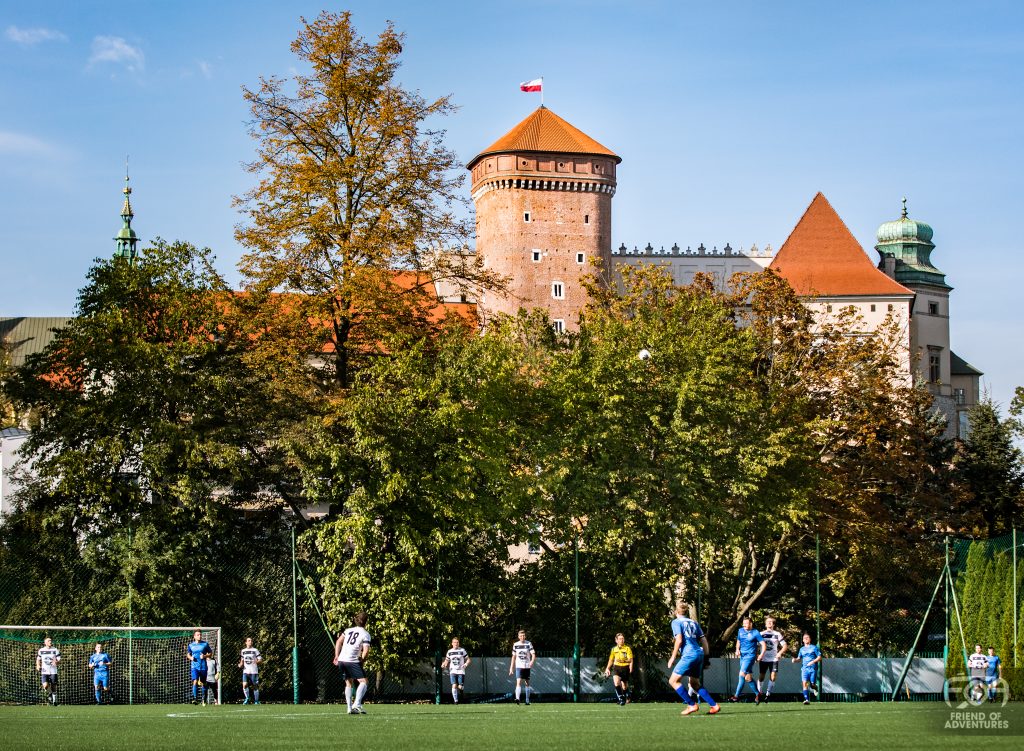 Krakow Dragoons FC vs Universum, with Wawel Castle in the background