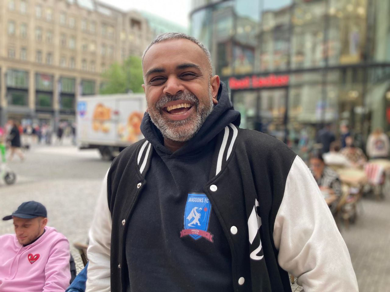 Ashvin Asani, head coach of Krakow Dragoons FC, smiling for the camera during a team visit to Prague