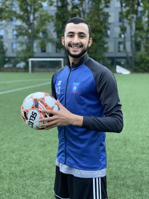 Salah Missi of Krakow Dragoons FC smiling for a roster photo