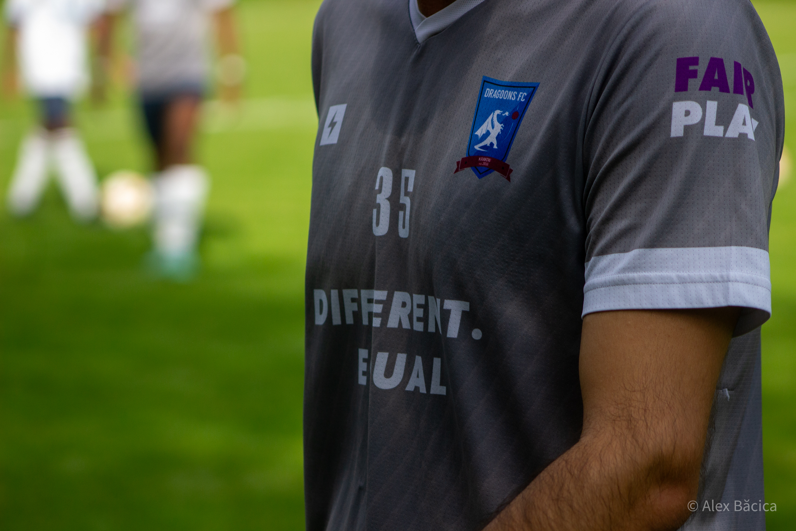 A Krakow Dragoons FC player wearing the "Different. Equal" training jersey