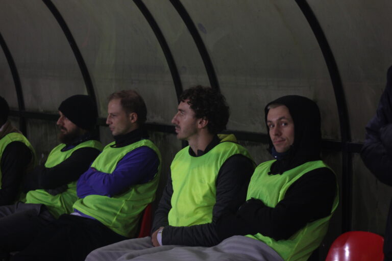 Krakow Dragoons FC players on the bench